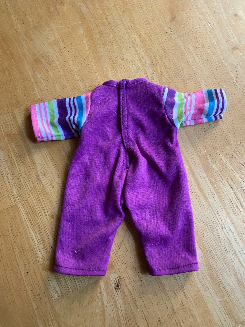 The purple baby doll romper from the My Sweet Love Baby Doll and Outfits Play Se - Picture 4 of 4